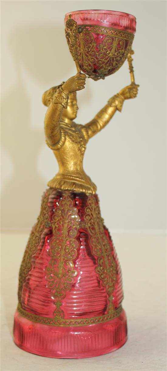 A German ruby glass and gilt metal figural marriage cup, probably Fritz Heckert, late 19th century, 26.5cm